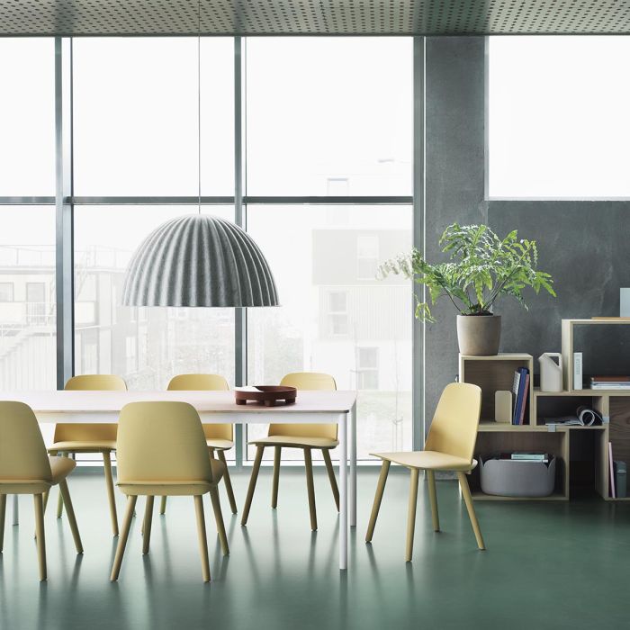 nerd-chair-sand-yellow-stacked-oak-under-the-bell-echo-pouf-beam-lamp-muuto-ilumia