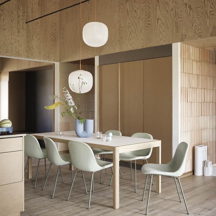 outline-3-seater-beige-leather-studio-chair-workshop-table-post-lamp-ply-muuto-ilumia